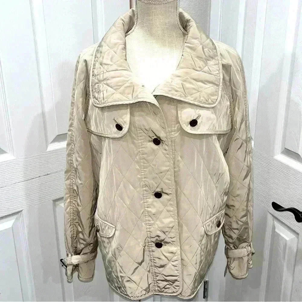 Talbots quilted, jacket with belted sleeves, pockets at chest and waist